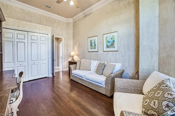 Bright den with tall windows can also convert to a 4th bedroom.