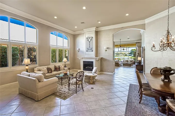 Bright and open living room and dining area w/gas fireplace
