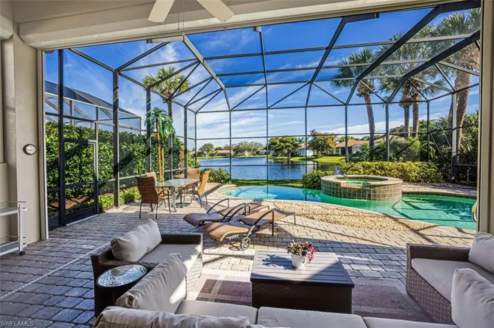 3 Sliders open to the pool/spa area with an amazing lake view