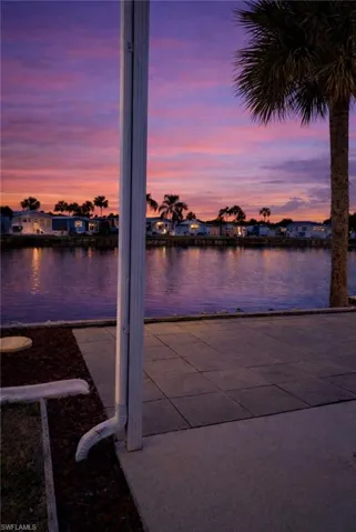 Water view with nearby suburban area