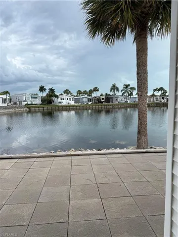 Water view with nearby suburban area