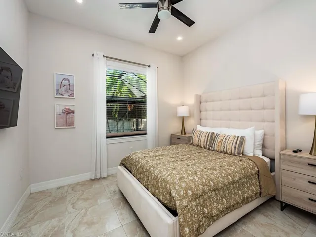 Bedroom with recessed lighting and a ceiling fan