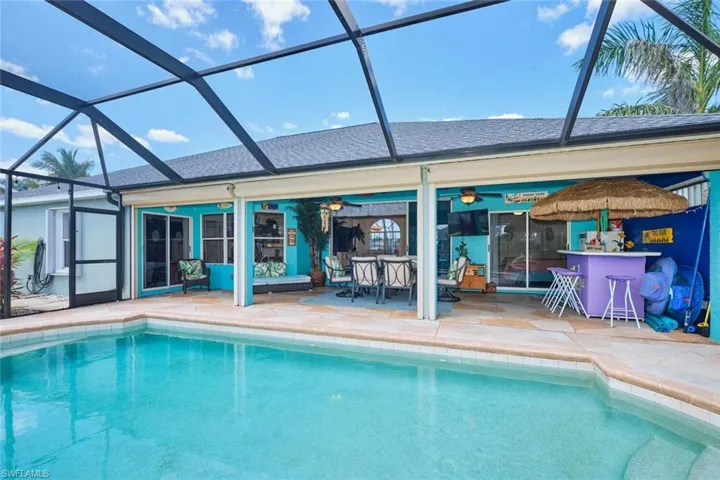 Outdoor pool with under truss lanai