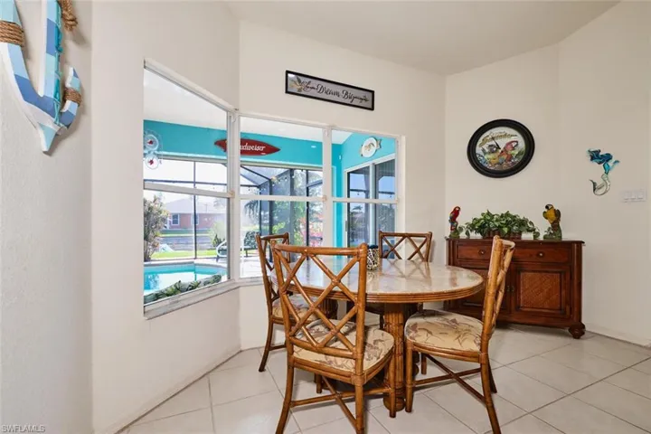View the pool and canal from the seating areaa