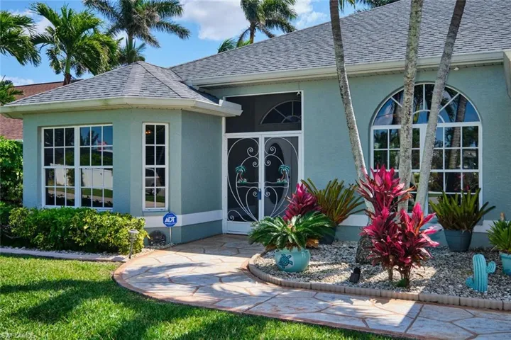 Grand Entrance with screened front door area