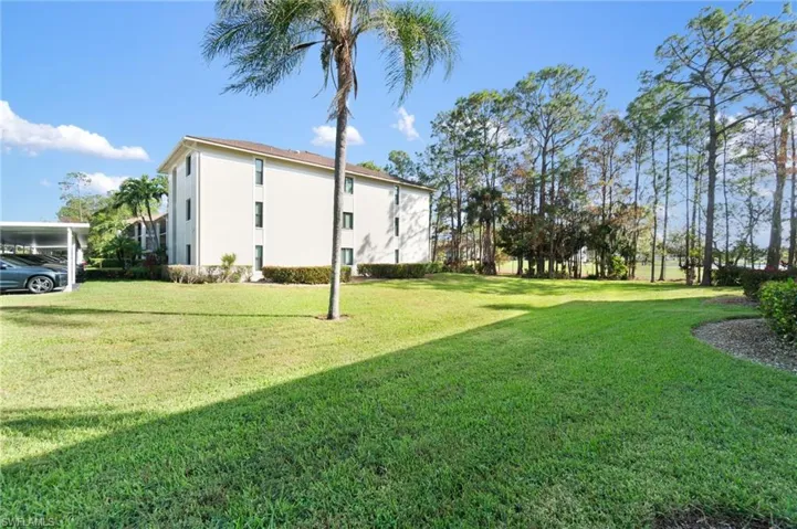 View of yard featuring a carport