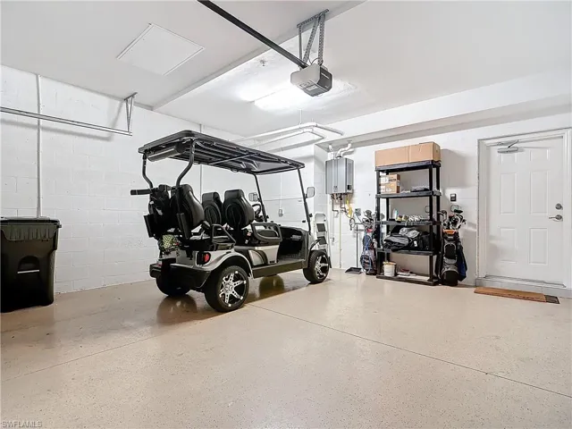 Garage featuring a garage door opener
