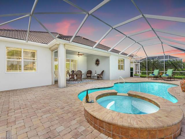 Screened  heated pool and above ground built-in spa on large lanai