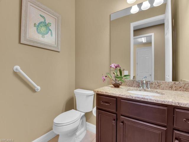 Powder room adjacent to great room