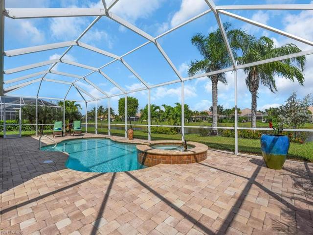 Screened  heated pool and above ground built-in spa on large lanai