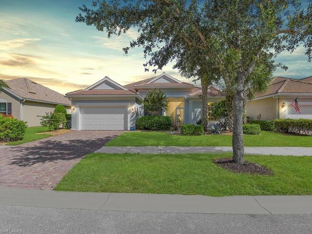 Wide lot, 2.5 car garage with room for a golf cart or small third car.