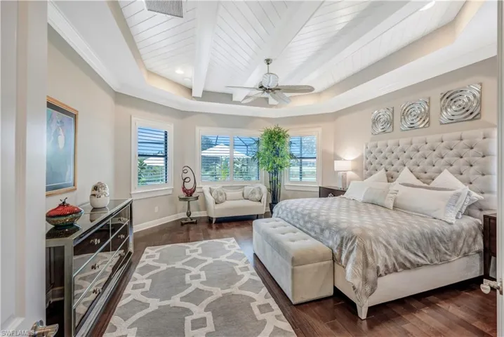 Rich wood flooring & ceiling detail