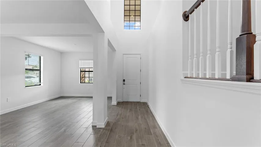 Foyer featuring wood-type flooring
