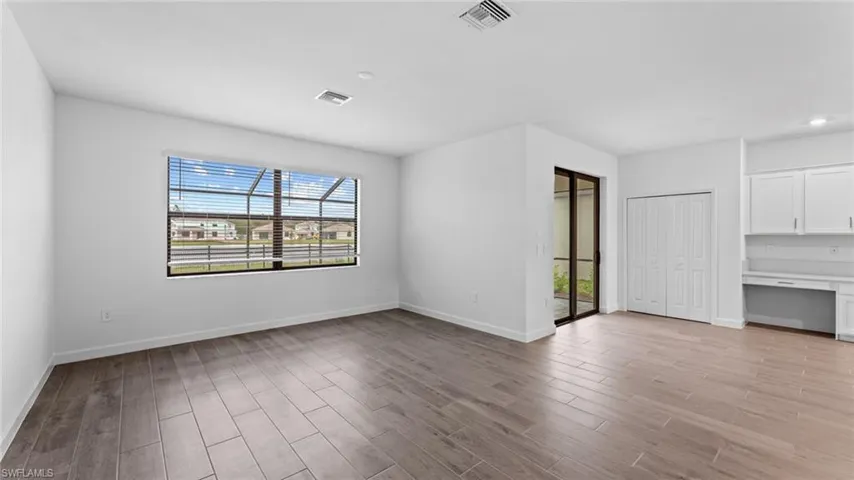 Empty room featuring light hardwood / wood-style floors