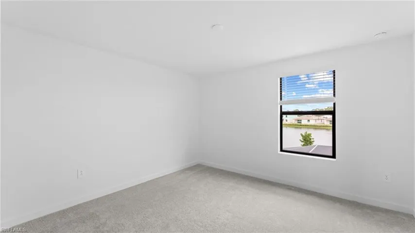 Empty room featuring carpet floors