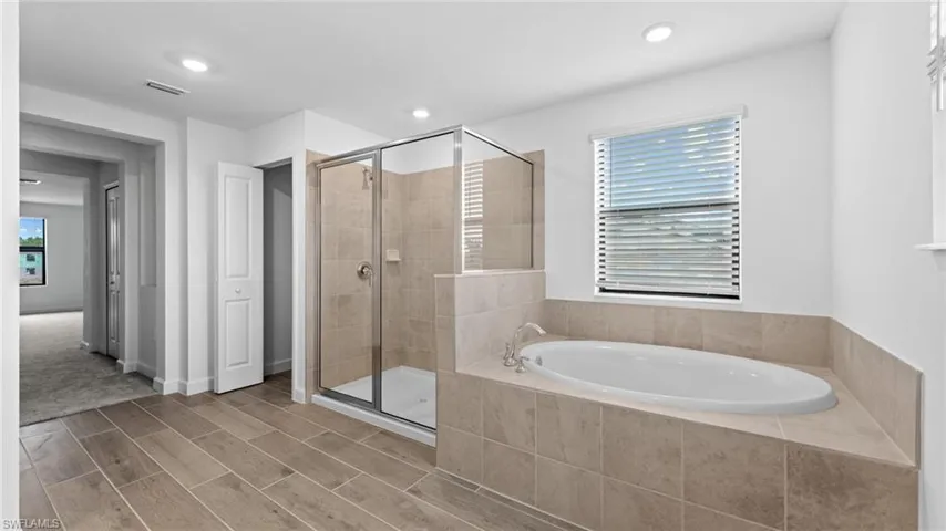 Bathroom with separate shower and tub