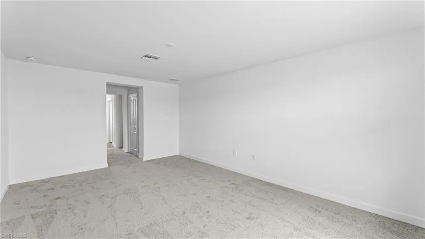 View of carpeted spare room