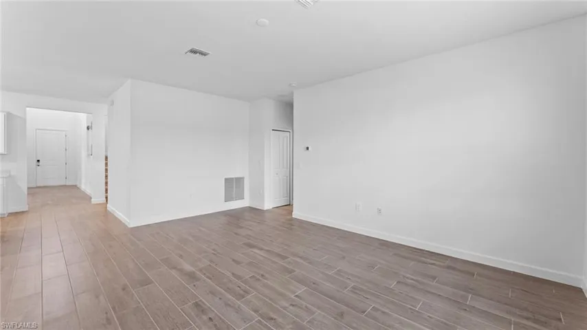 Unfurnished room featuring light hardwood / wood-style floors