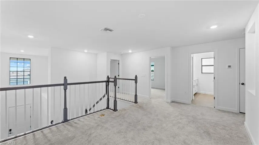 View of carpeted spare room