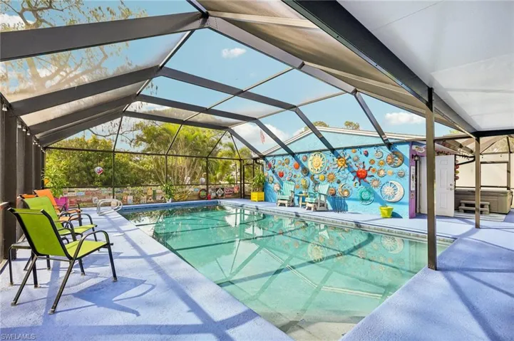 Outdoor pool with screen enclosure