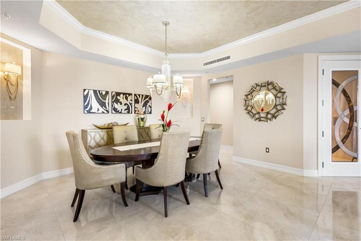 Formal dining space, custom lighting.  Tray ceiling,