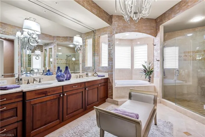 Dual comfort height granite vanities. Soaking zen tub, walk in shower.
