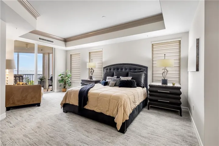Wake up in your primary oasis and step out onto your lanai and enjoy the boats coming in and out of the marina and watch the Osprey at Eagle's Perch! Beutiful tray ceiling warm carpet. Cozy seating area by the lanai where you can curl up and read a good book!