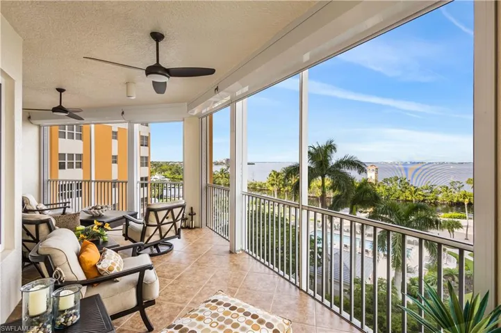 Tranquil views of the Caloosahatchee River, boats coming in and out of the marina, and relaxing sunsets.  This is the 1st of 2 sprawling lanais! HURRICANE PROTECTION THROUGHOUT!
