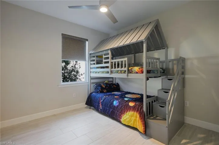 Bedroom featuring ceiling fan