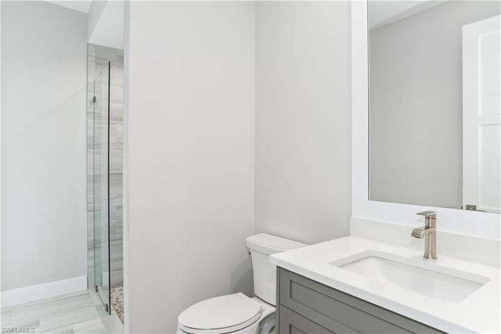 Full bathroom, off  pool and lanai