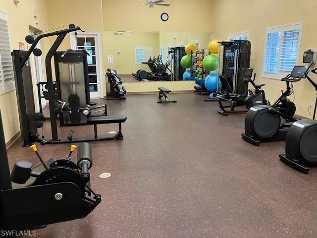 Exercise room with a ceiling fan