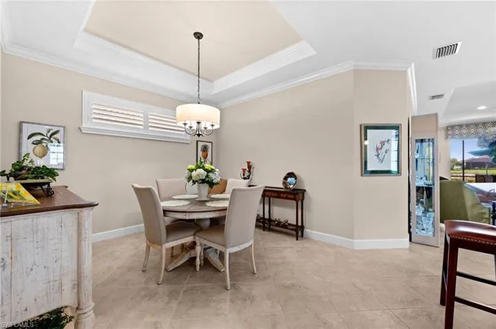 Tray ceiling with crown molding and recessed lighting