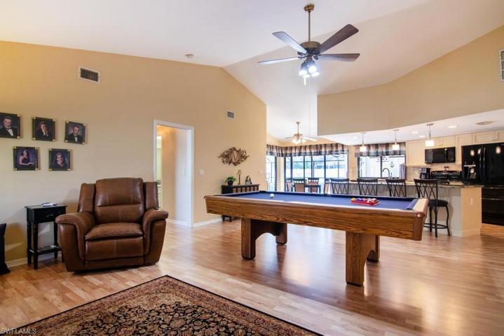 Family Room looking towards Kitchen with doorway to Guest Bedrooms (background left of center).