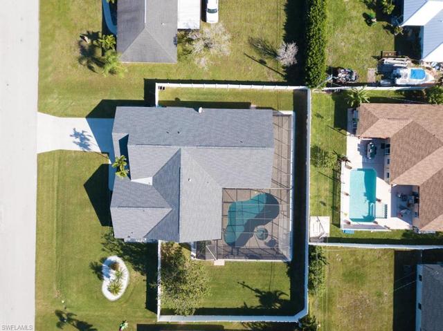 Overhead view of this 3 Lot home site and pool.