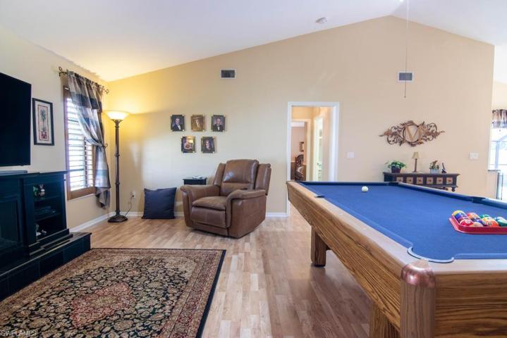 Family Room with hallway to Guest Bedrooms (background center).