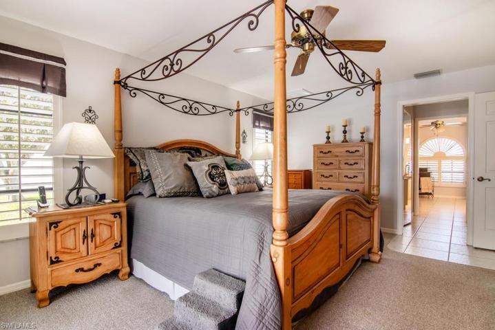 Master Suite with  hallway to Master Bathroom in background.