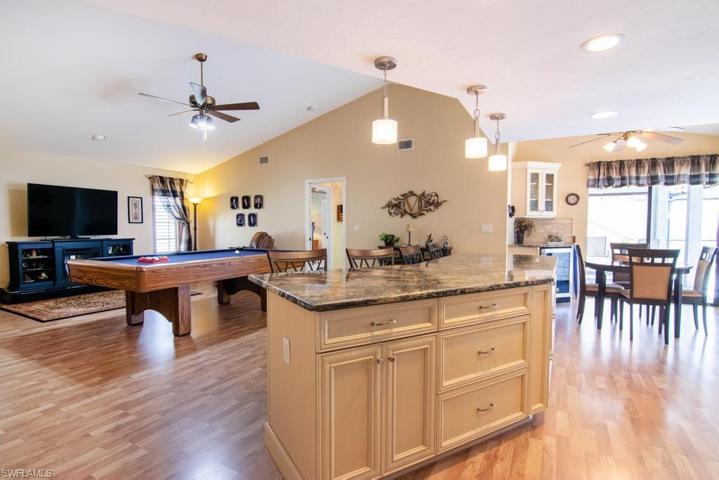 A large Center Island breakfast bar is open to the Family Room.