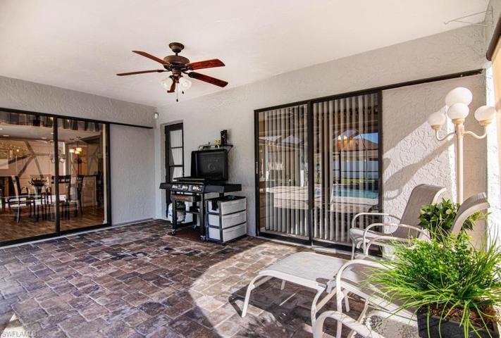 The Second Lanai has pocketing slider door access from a Guest Bedroom and the Kitchen. Pool Bath door is to the left of grill.