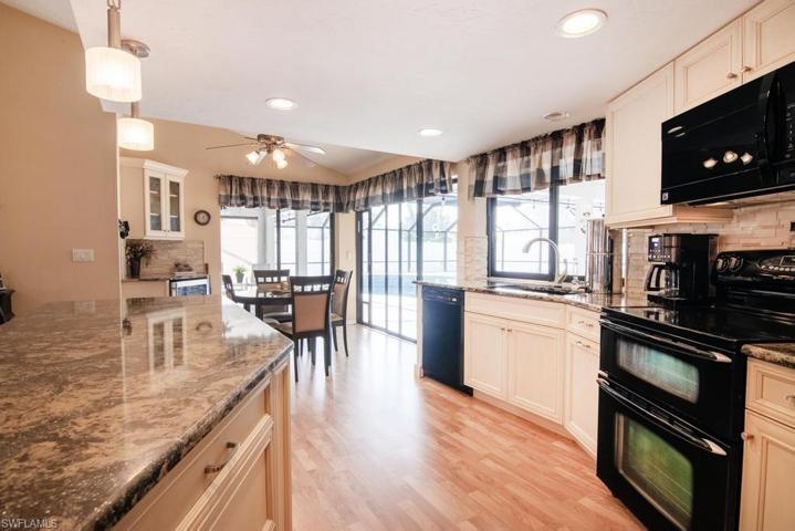 Kitchen with Breakfast Nook in the background.
