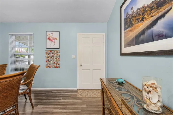 Office featuring wood finished floors and baseboards