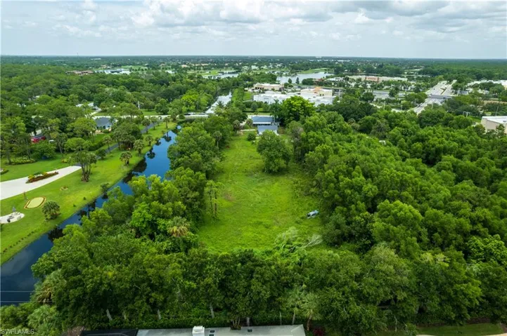 Rear view of property featuring a water view