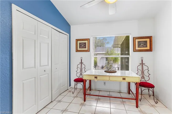 Tiled home office with ceiling fan