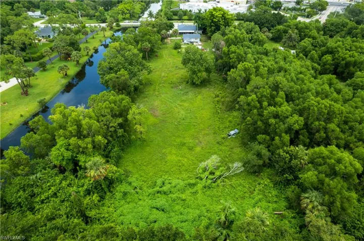 Drone / Rear view featuring a water view