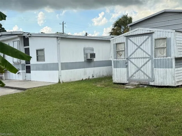 View of shed featuring cooling unit