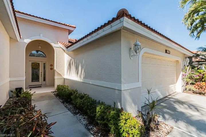 Property entrance with a garage