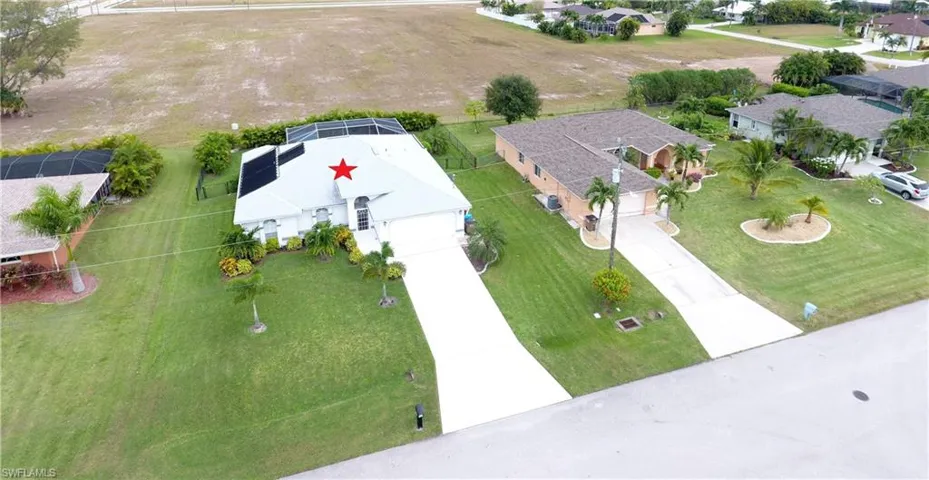 Aerial showing vacant lot behind zoned ML-single family residence