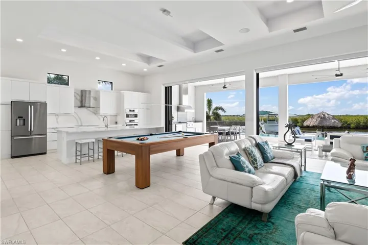 Great room is open to the kitchen and outdoors - this is a very fun, flexible and flowing floor plan!
