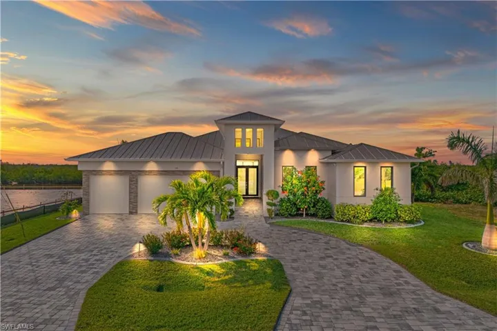Curb appeal alert!  Double door entry with large covered outdoor foyer!  All hurricane impact windows and doors, NO FLOODING ever!  Transferrable flood insurance currently $844 a year!  Home sits high and dry!