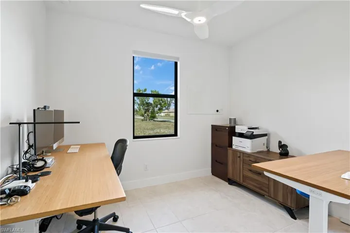 Office with room for two desks and plenty of room to move around!  Another light and bright room!