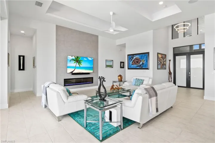 View of the GREAT room with double door private entry - abundant natural light throughout!